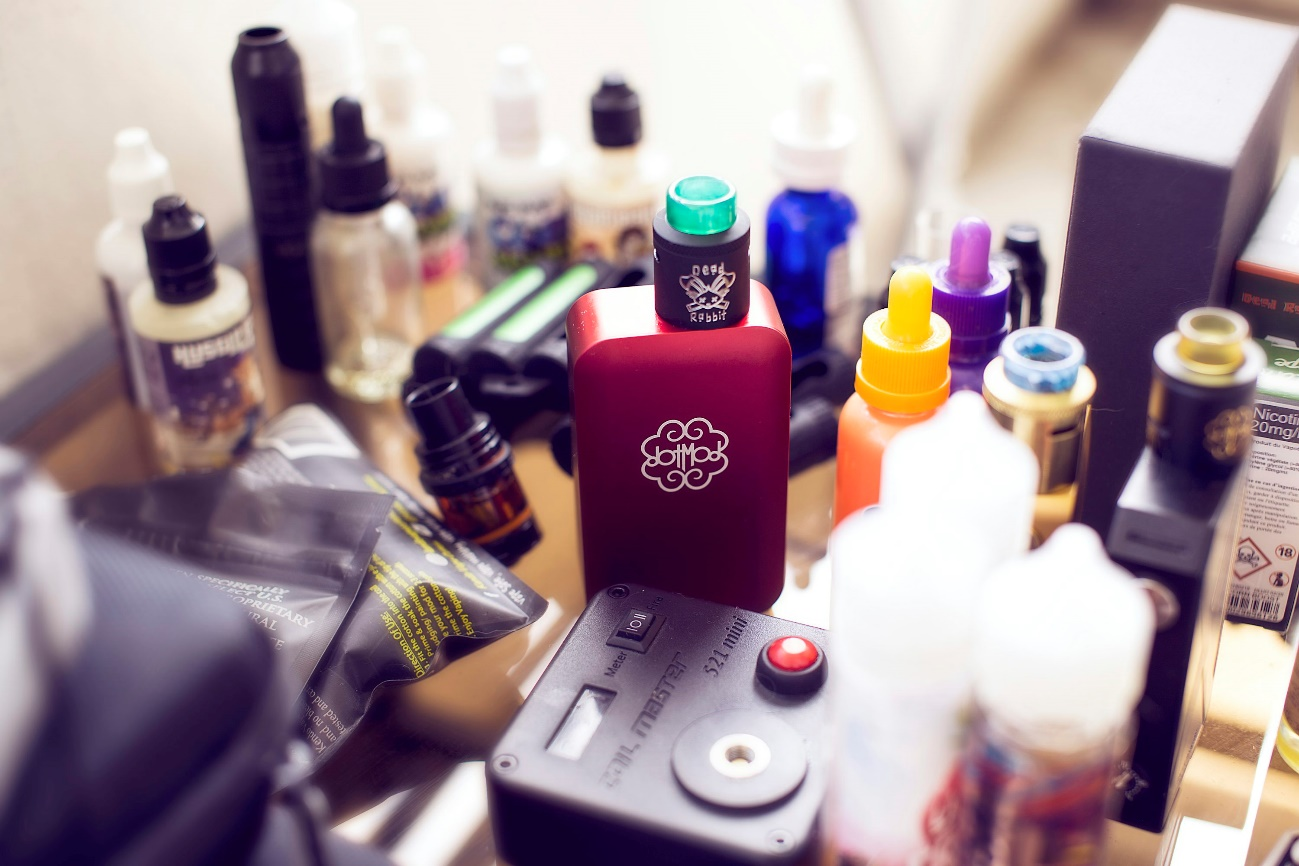 A variety of vapes on a table.